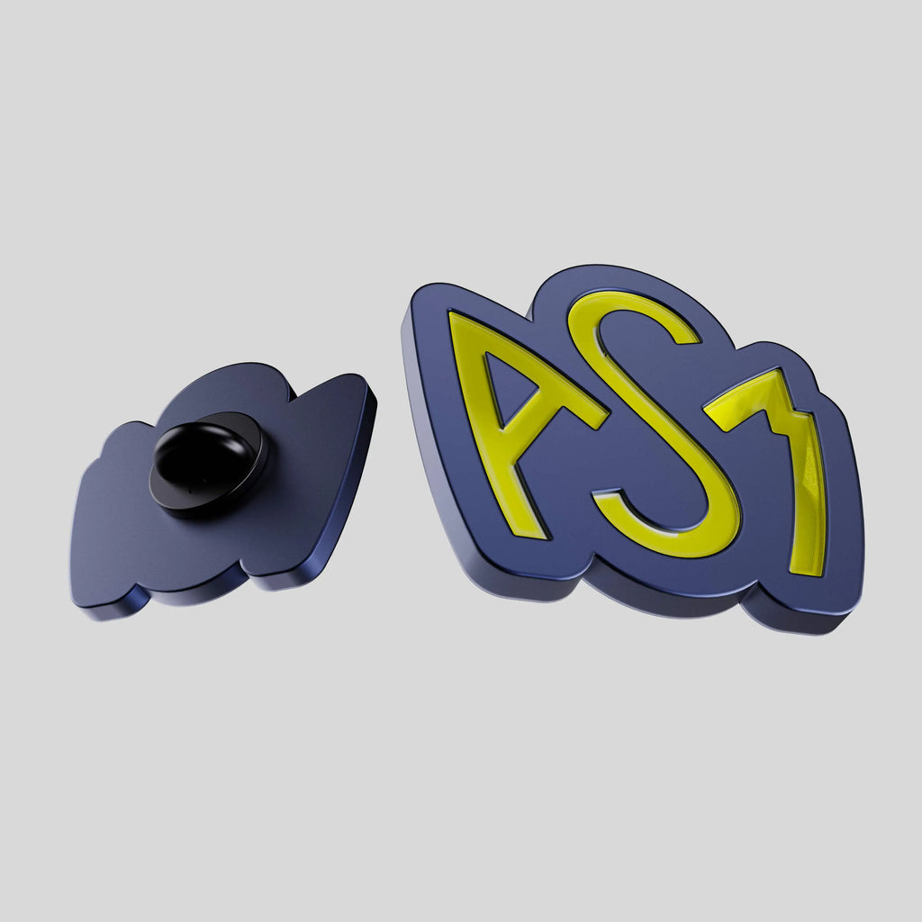 pin's bleu avec émaillage jaune écrit ASM