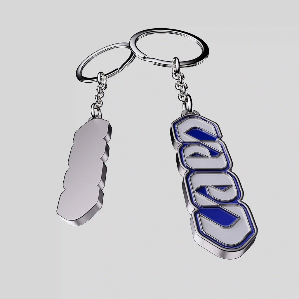 porte clé en métal avec émaillage couleur bleu